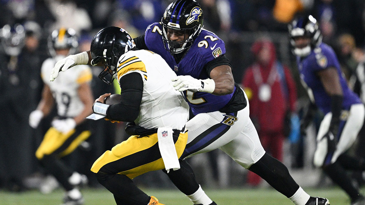 Jan 11, 2025; Baltimore, Maryland, USA; Baltimore Ravens defensive tackle Nnamdi Madubuike (92) tackles Pittsburgh Steelers quarterback Russell Wilson (3) in the third quarter in an AFC wild card game at M&T Bank Stadium. Mandatory Credit: Tommy Gilligan-Imagn Images