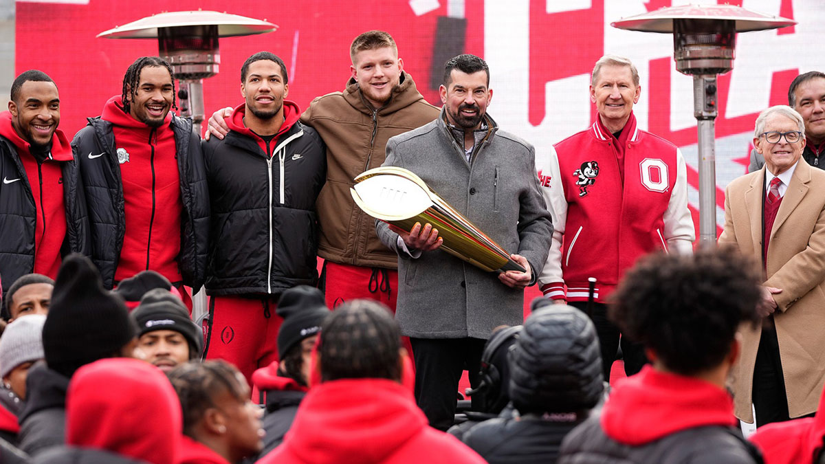 Ohio State Buckeyes head coach Ryan Day holds the College Football Playoff trophy during the Ohio State Buckeyes National Championship celebration at Ohio Stadium
