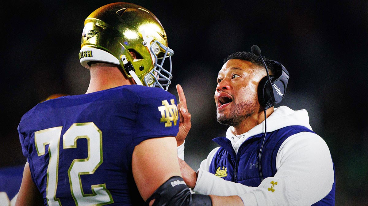 Notre Dame head coach Marcus Freeman coaches offensive lineman Sam Pendleton (72) after Pendleton received an unsportsmanlike conduct penalty during a NCAA college football game against Florida State at Notre Dame Stadium on Saturday, Nov. 9, 2024, in South Bend.
