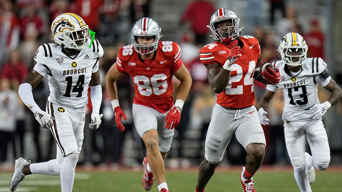 Ohio State Buckeyes running back Sam Williams-Dixon (24) runs upfield past Western Michigan Broncos cornerback Lorenzo Williams Jr. (14) during the second half of the NCAA football game at Ohio Stadium.