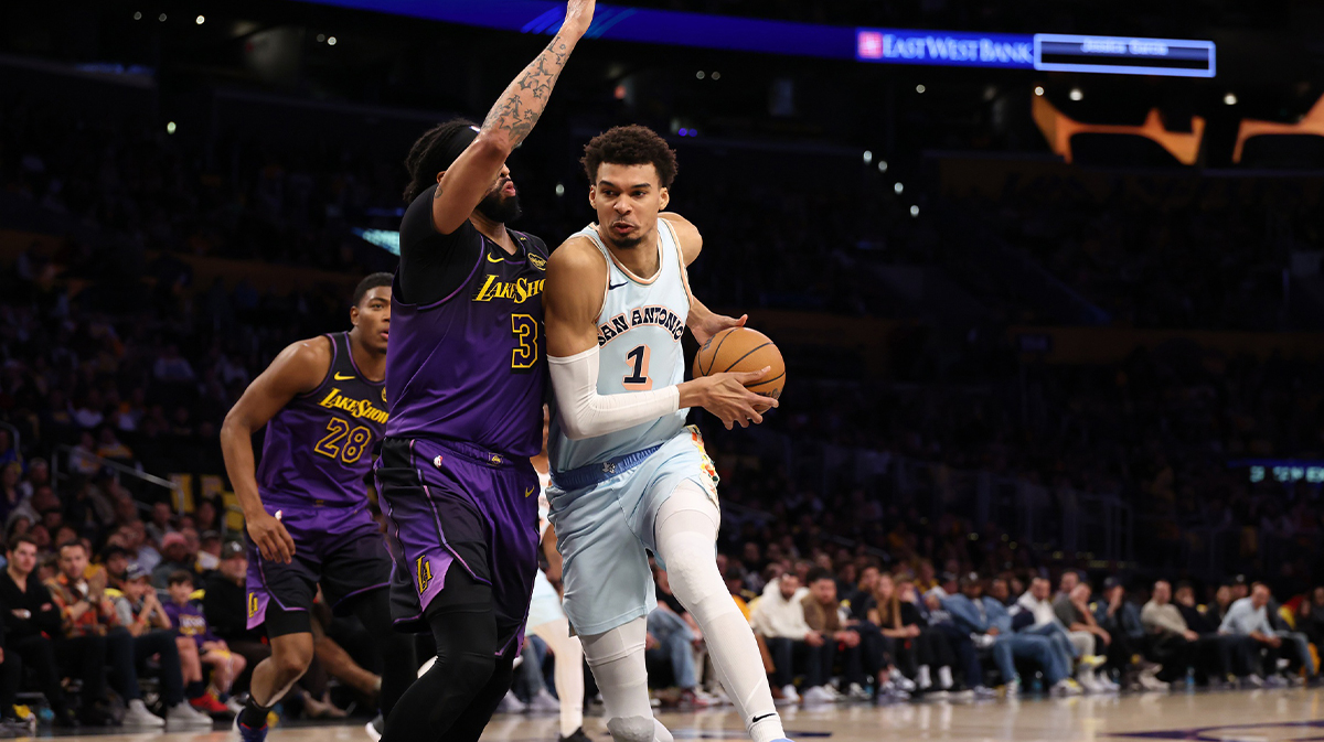 San Antonio Spurs center Victor Wembanyama (1) drives to the basket against Los Angeles Lakers forward Anthony Davis (3) during the second half at Cripto.com Arena. 