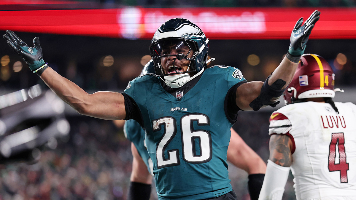 Philadelphia Eagles running back Saquon Barkley (26) celebrates after a touchdown against the Washington Commanders during the second half in the NFC Championship game at Lincoln Financial Field.