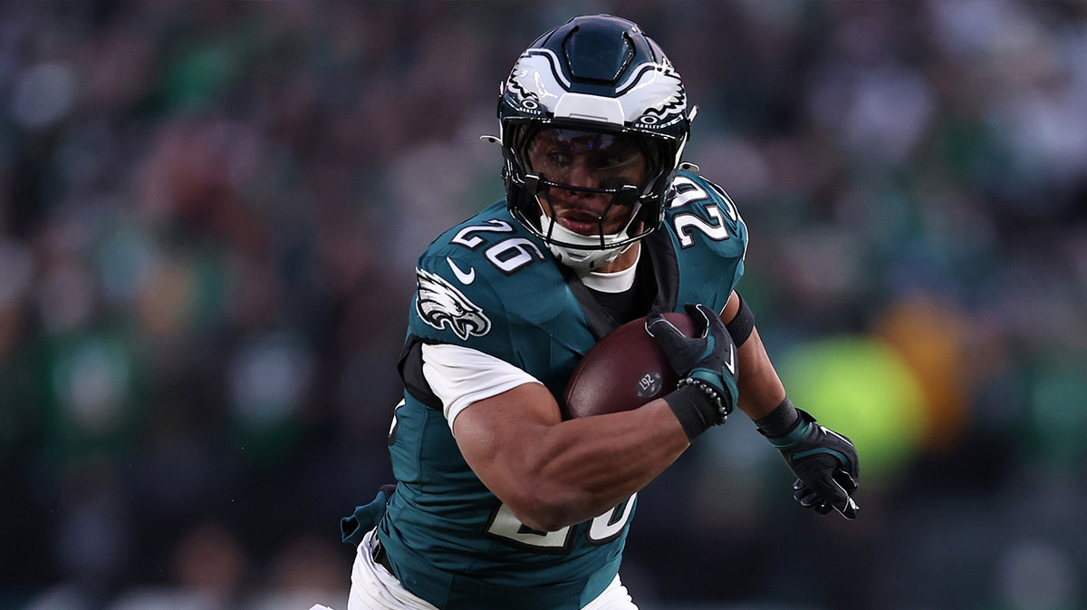 Philadelphia Eagles running back Saquon Barkley (26) rushes the ball against the Green Bay Packers during the first quarter in the NFC wild card game at Lincoln Financial Field. 