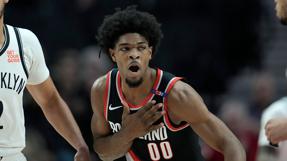 Portland Trail Blazers guard Scott Henderson (00) reacts after a three-pointer against the Brooklyn Nets during the first half at the Moda Center.