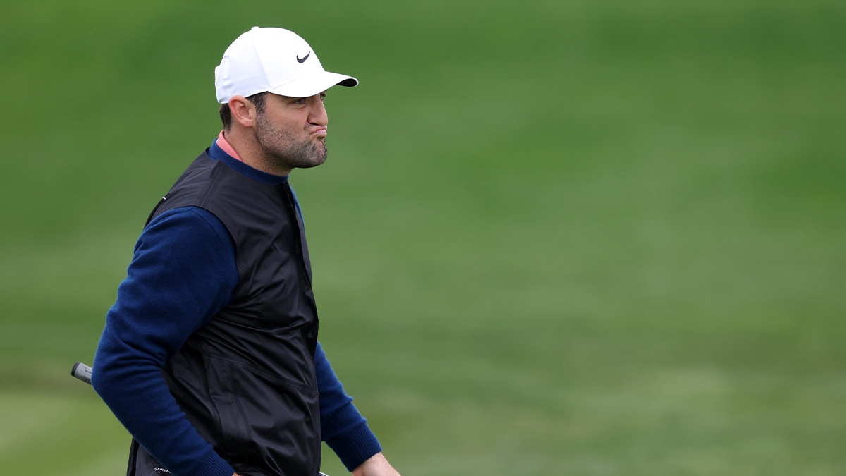 Scottie Scheffler reacts after missing a long putt on the 17th green during the second round of the AT&T Pebble Beach Pro-Am golf tournament at Pebble Beach Golf Links.
