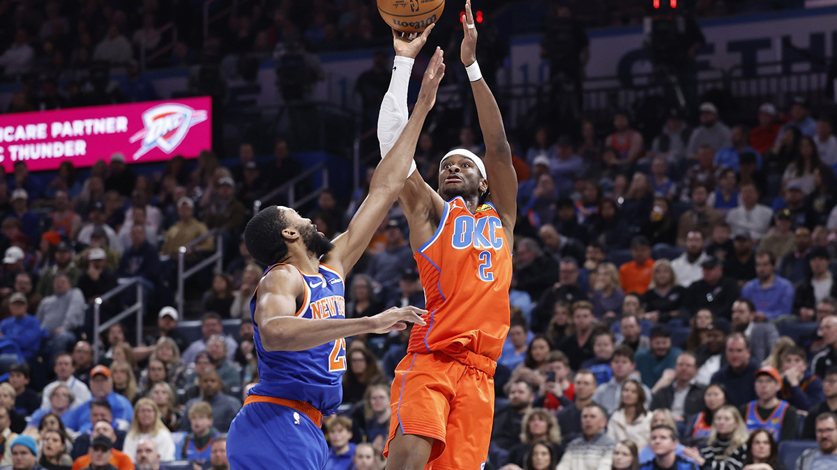 Oklahoma City Thunder guard Shai Gilgeous-Alexander (2) shoots as New York Knicks forward Mikal Bridges (25) defends during the second half at Paycom Center.