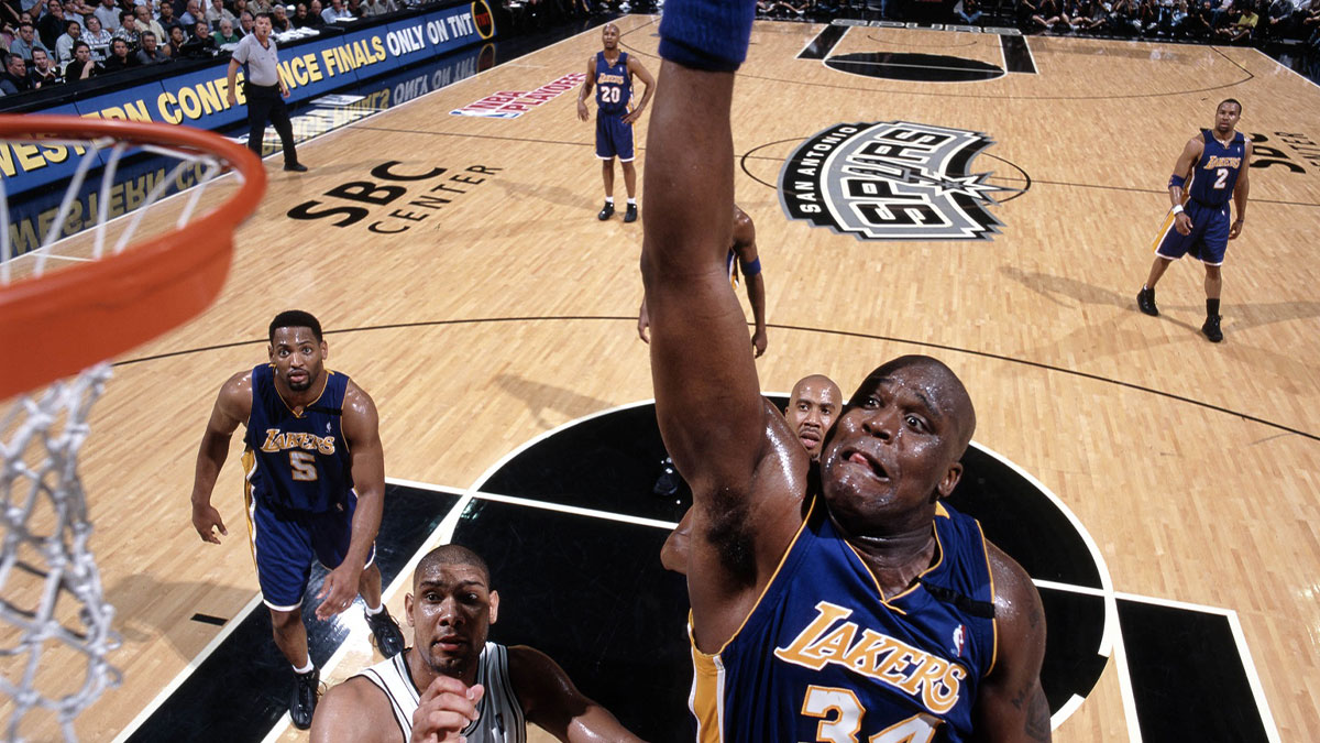 Los Angeles Lakers center Shaquille O'Neal (34) dunks the ball against the San Antonio Spurs at the Alamo Dome.