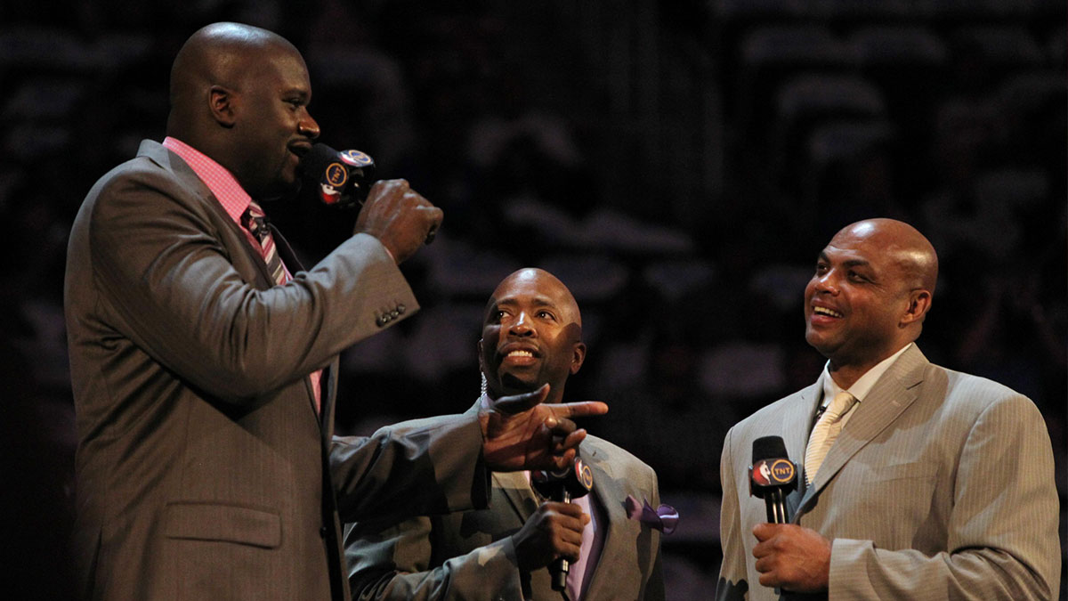 TNT anchor Kenny Smith introduces Team Shaq general manager Shaquille O'Neal and Team Chuck general manager Charles Barkley before the BBVA rising stars challenge at the Amway Center in Orlando. Mandatory Credit: Kim Klement-Imagn Images