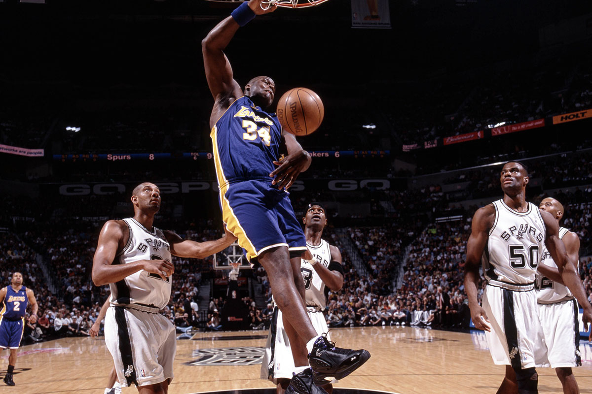 Los Angeles Lekers Center Shakuille O'Neal (34) Dunks Balls against San Antonio Spurs on Alamo Dome.