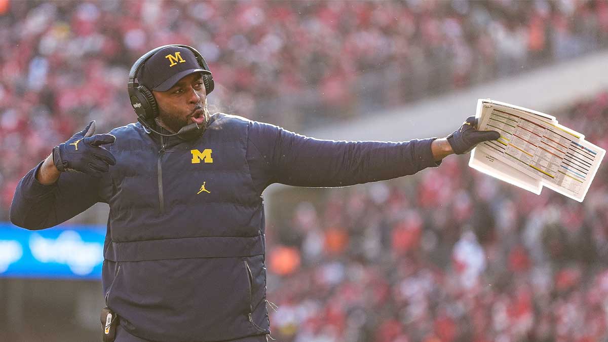 Michigan head coach Sherrone Moore celebrates after place kicker Dominic Zvada scores a field goal against Ohio State during the second half at Ohio Stadium