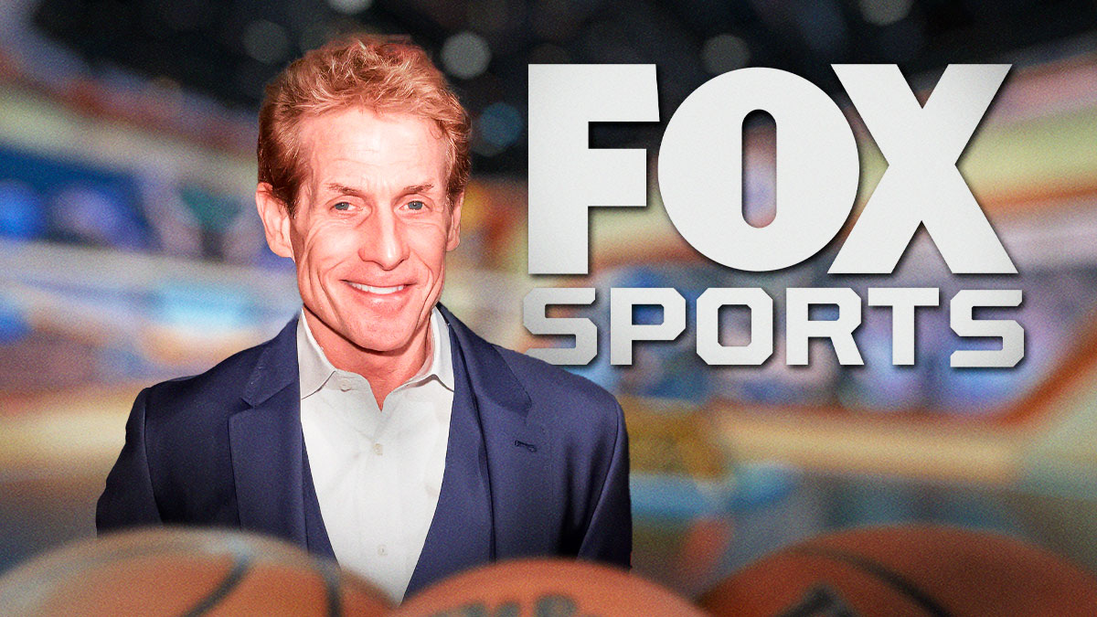 Fox Sports host Skip Bayless with the Fox Sports logo behind him