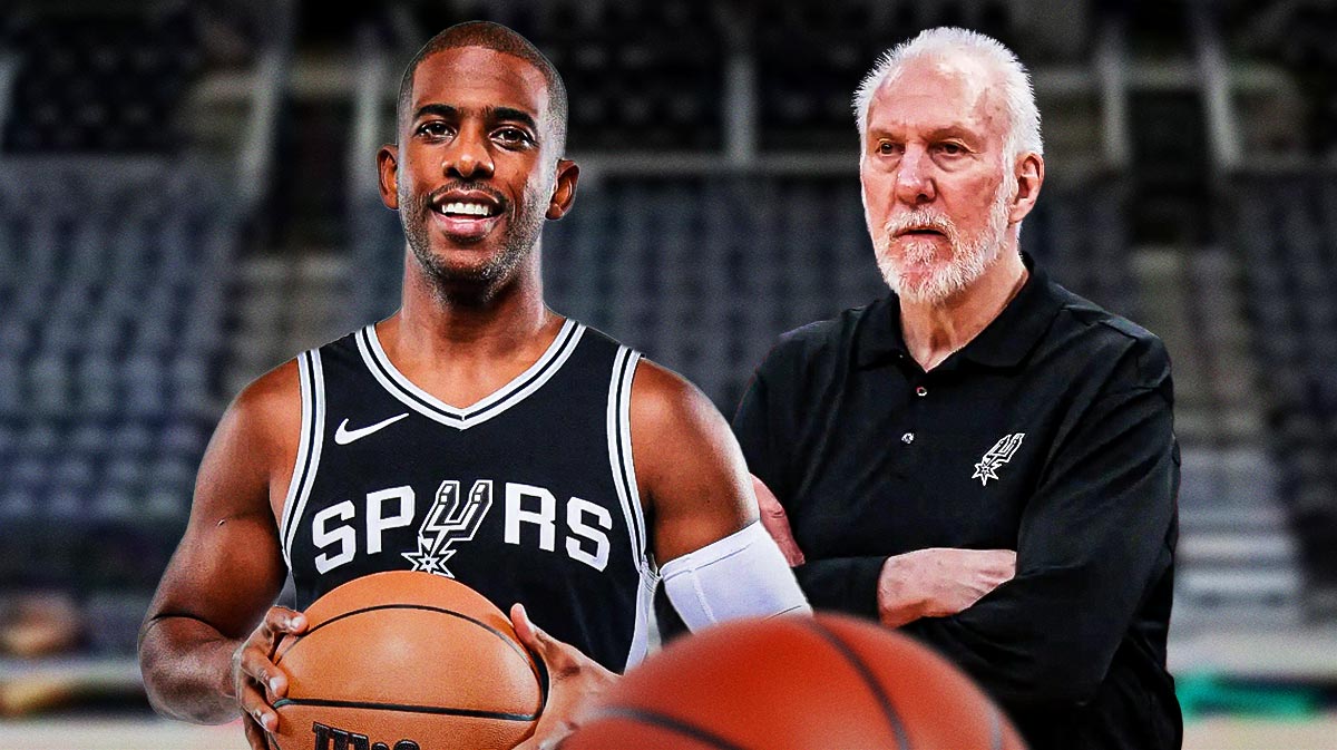 Photo: Chris Paul in Spurs jersey smiling at Gregg Popovich