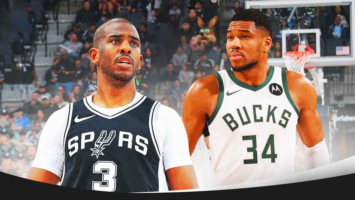 Chris Paul and Giannis Antetokounmpo both looking angry at each other.
