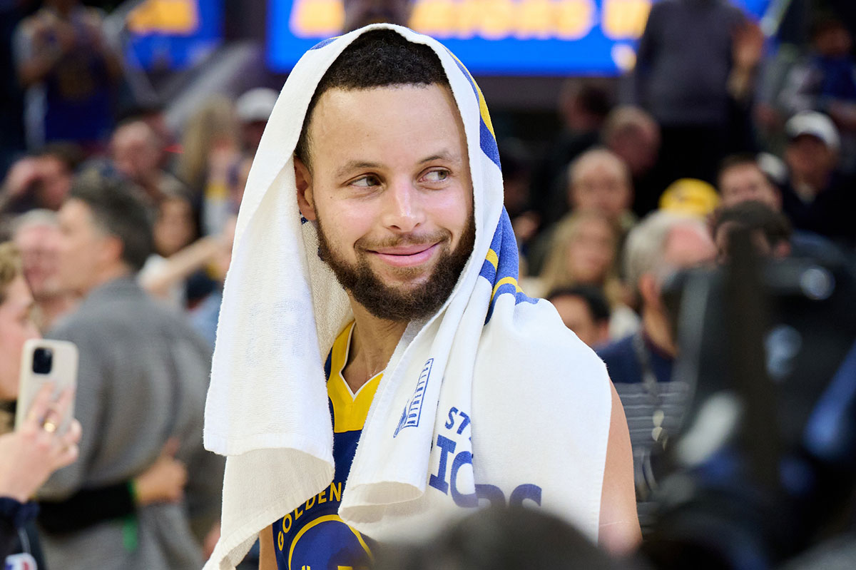 Golden State Warriors guard Stephen Curry (30) reacts on the court after the game against the Phoenix Suns at Chase Center.