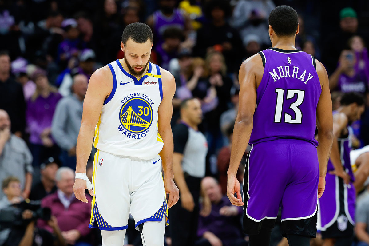 Golden State Warriors guard Stephen Curry (30) walks up the court against the Sacramento Kings during the fourth quarter at Golden 1 Center.