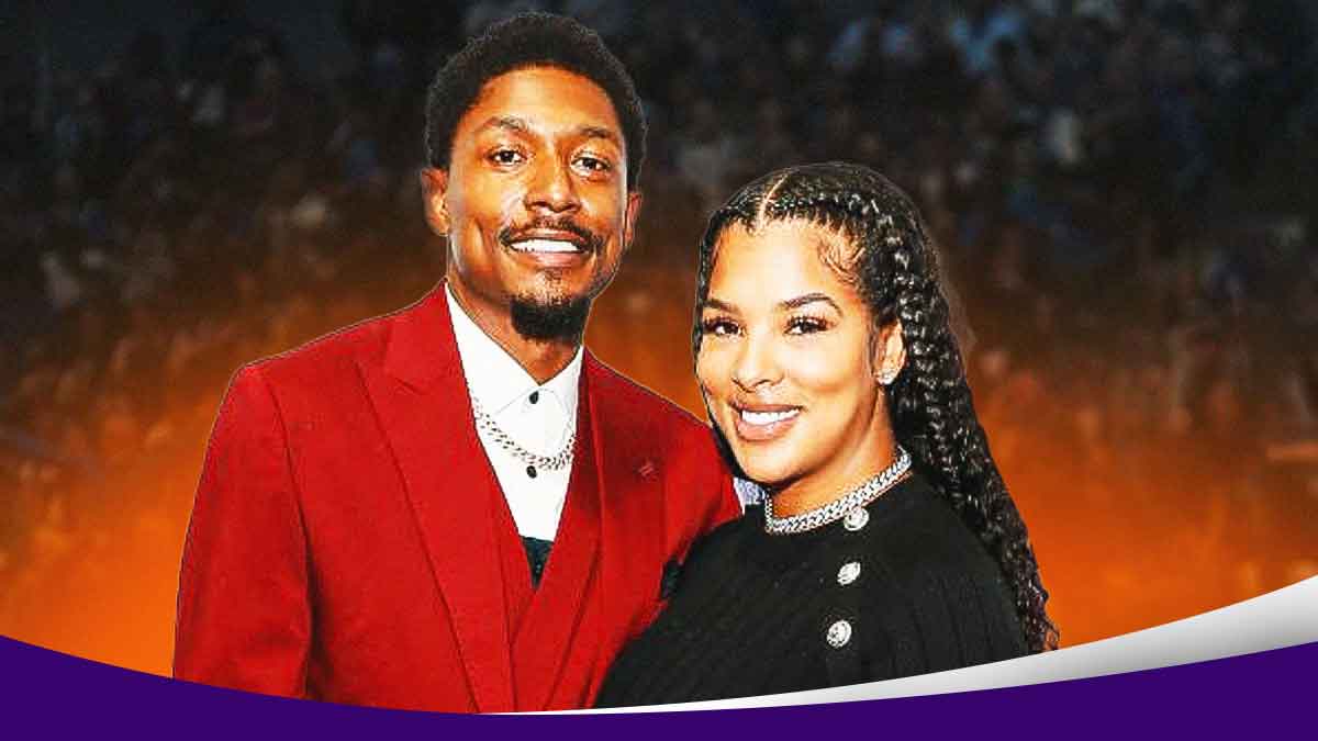 Bradley Beal beside his wife.