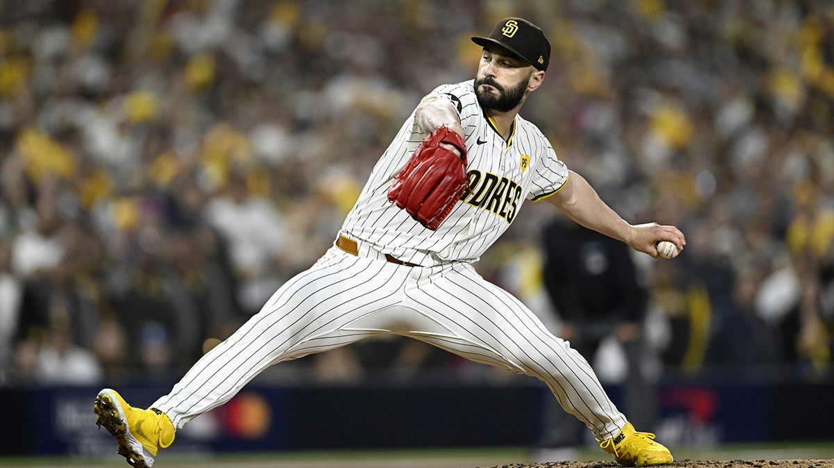 San Diego Padres pitcher Tanner Scott (66) throws in the eighth inning against the Los Angeles Dodgers during game three of the NLDS for the 2024 MLB Playoffs at Petco Park.