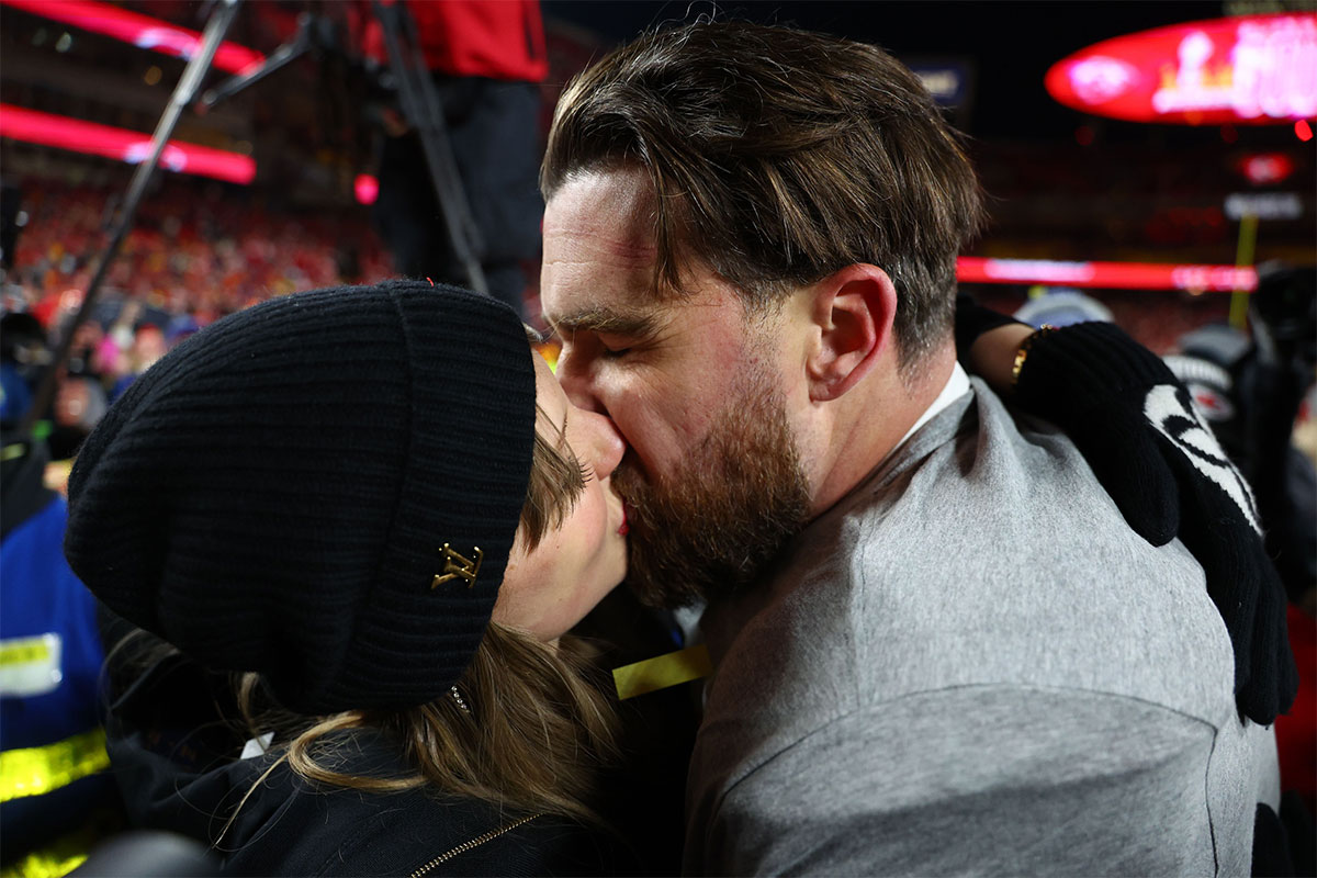 Taylor Swift, Travis Kelce kissing after Chiefs' AFC Championship win against the Bills.