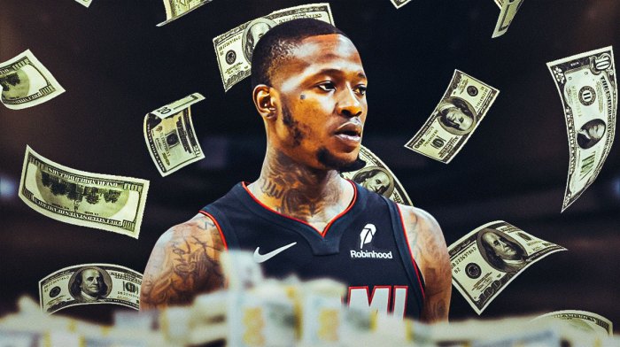 Terry Rozier with money around him