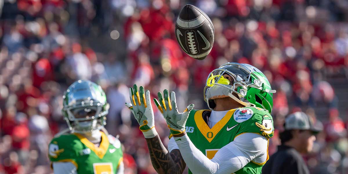 Oregon wide receiver Tez Johnson catches the ball during warmups as the Oregon Ducks face the Ohio State Buckeyes Wednesday, Jan. 1, 2025, in the quarterfinal of the College Football Playoff at the Rose Bowl