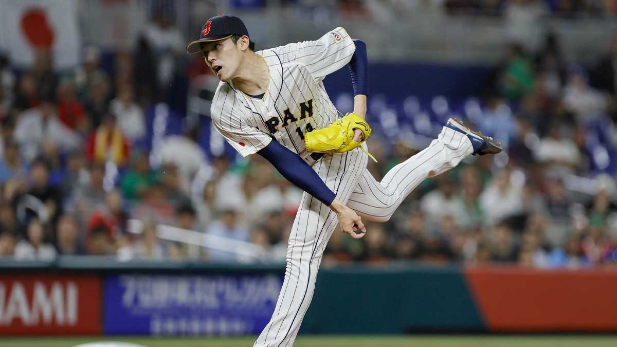 Japan starting pitcher Roki Sasaki (14) delivers a pitch during the first inning against Mexico at LoanDepot Park.