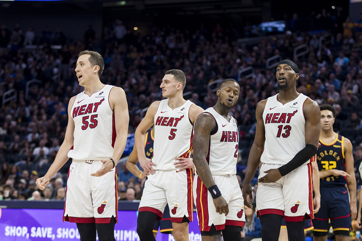 Miami Heat forward Duncan Robinson (55) and forward Nikola Jovic (5) and guard Terry Rozier (2) and center Bam Adebayo (13) react to a foul call during the fourth quarter against the Golden State Warriorsat Chase Center. 