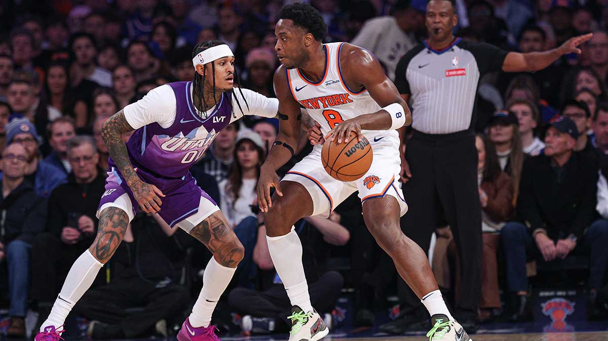 New York Knicks forward OG Anunobia (8) guards Utah Jazz guard Jordan Clarkson (00) during the first half at Madison Square Garden.