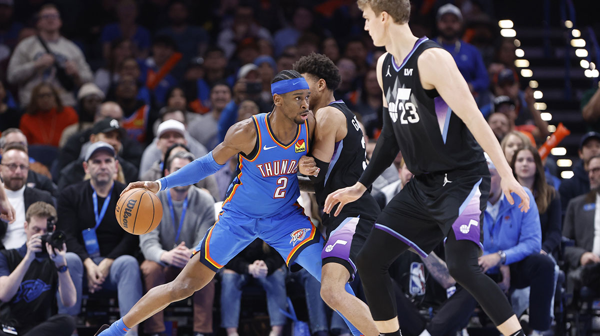 Thunder guard Shai Gilgeous-Alexander (2) drives to the basket against the Utah Jazz during the second half at Paycom Center