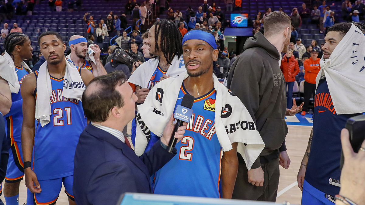 Thunder guard Shai Gilgeous-Alexander (2) speaks to a tv reporter after their game against the Utah Jazz at Paycom Center