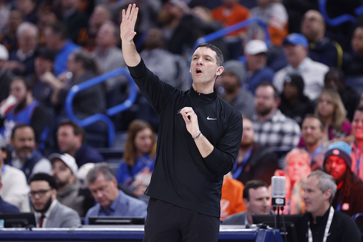 Thunder head coach Mark Daigneault gestures to his team during play against the Cleveland Cavaliers during the second quarter at Paycom Center