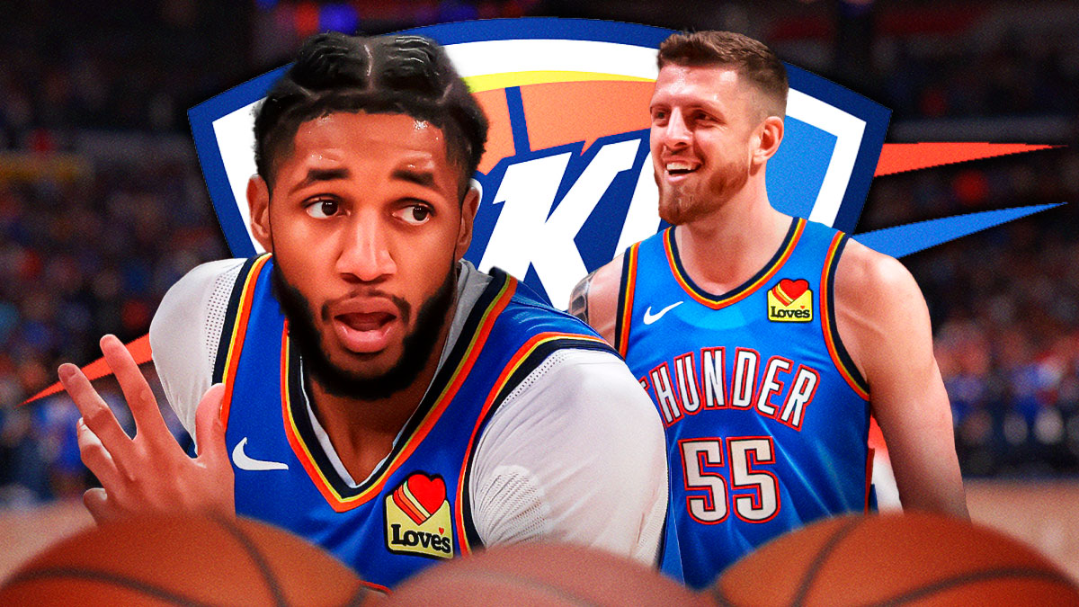 Thunder guard Isaiah Joe next to Thunder center Isaiah Hartenstein and the Thunder logo in the background