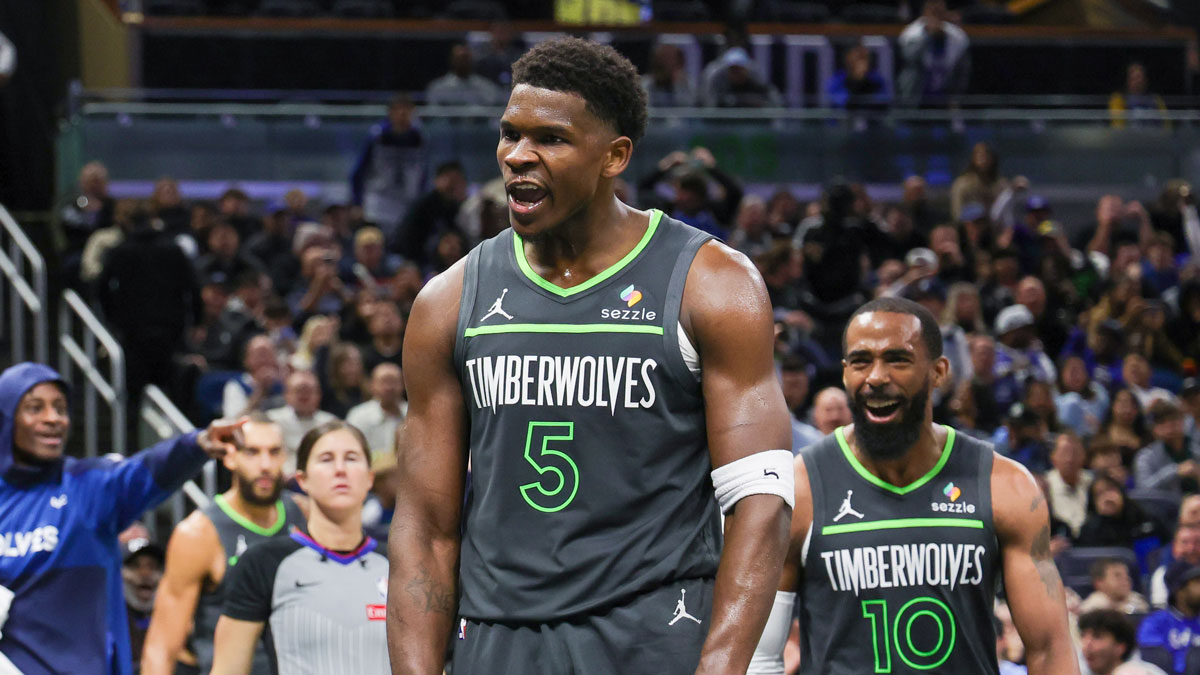 Timberwolves guard Anthony Edwards (5) reacts after scoring in the second half against the Orlando Magic at the Kia Center