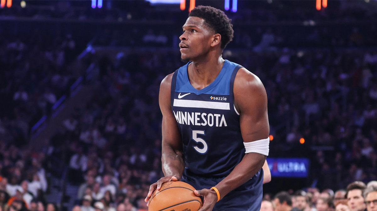 Minnesota Timberwolves guard Anthony Edwards (5) finds the net for a three-point shot attempt in the first quarter against the New York Knicks at Madison Square Garden. 