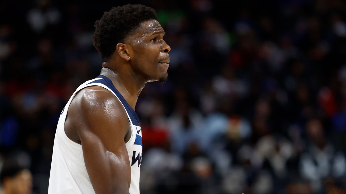Minnesota Timberwolves guard Anthony Edwards (5) reacts in the second half against the Detroit Pistons at Little Caesars Arena.