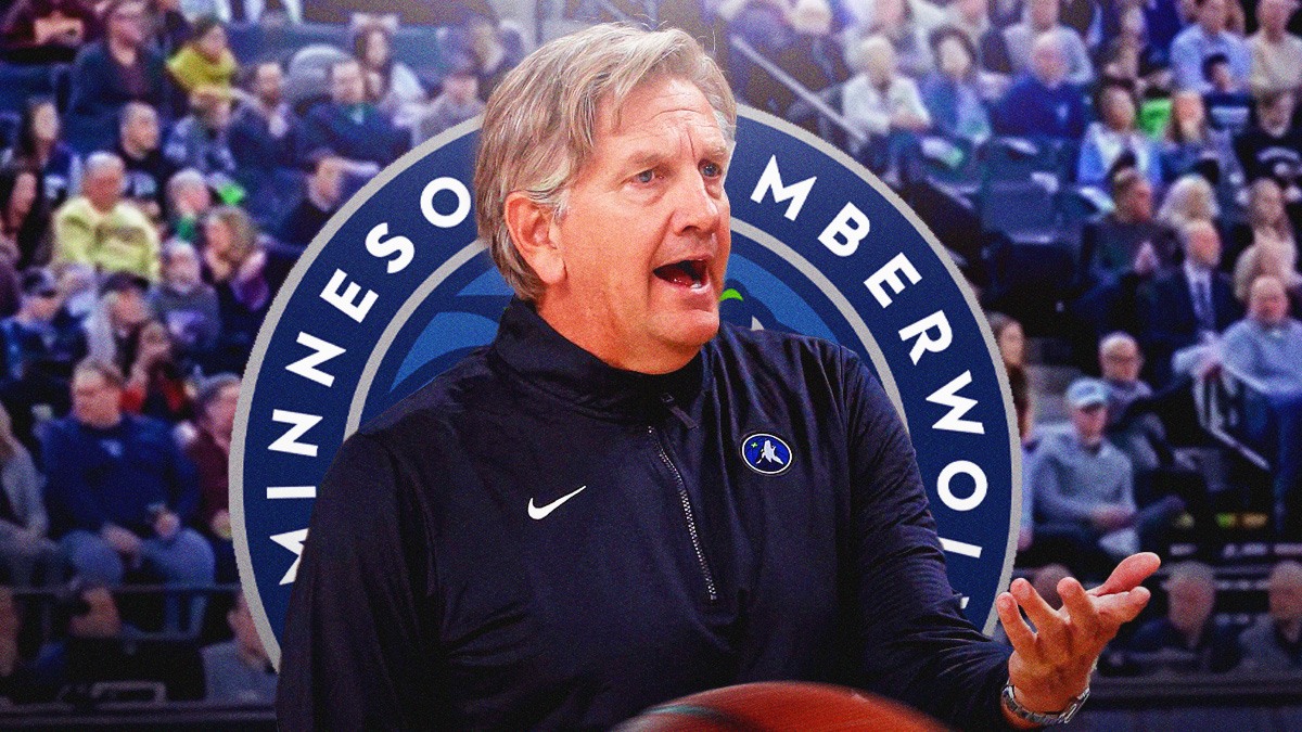 Chris Finch, Timberwolves logo in the background