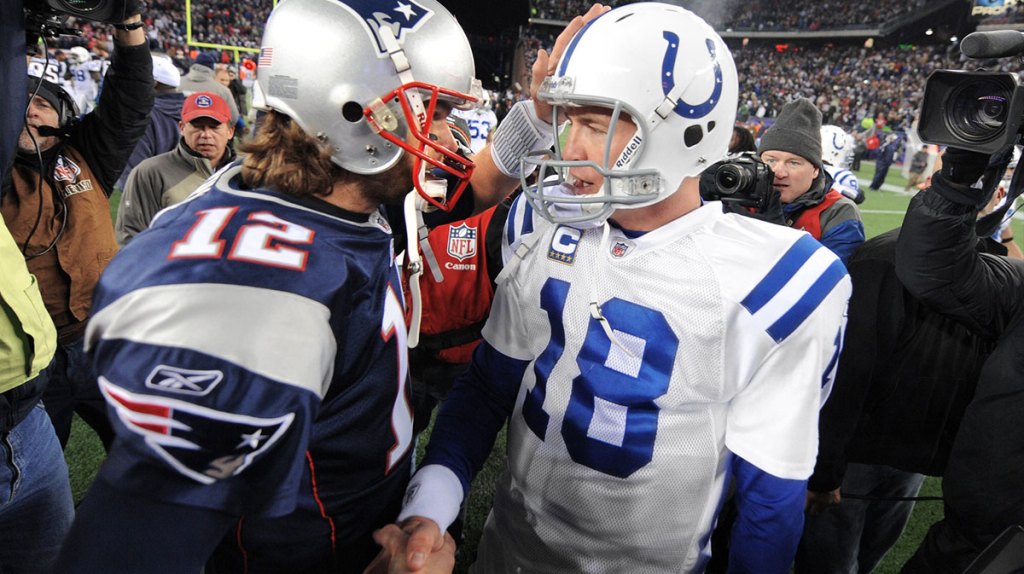 Indianapolis Colts quarterback Peyton Manning, right, meets with New England Patriots quarterback Tom Brady after a game at Gillette Stadium on Nov. 21, 2010. The Colts lost 31-28.