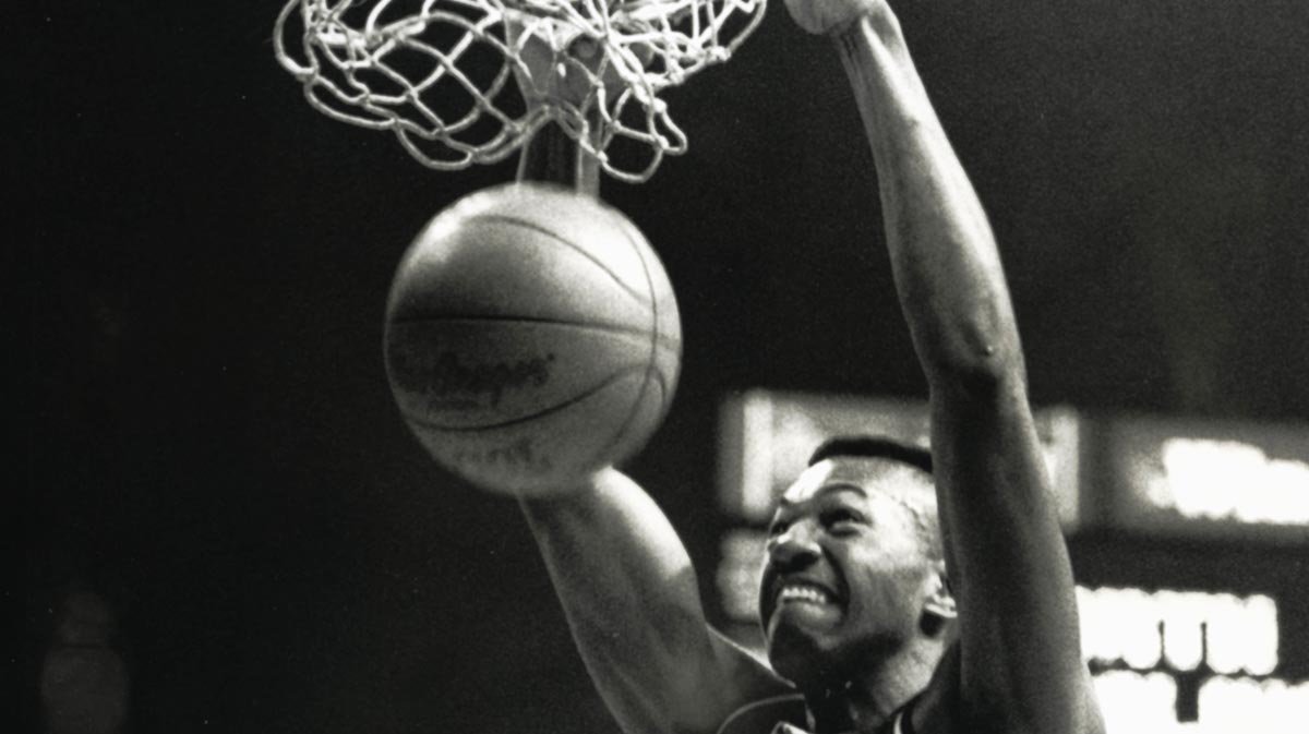 Maryland Terrapins forward Tony Massenburg (25) dunks the ball during the 1987-88 season. 