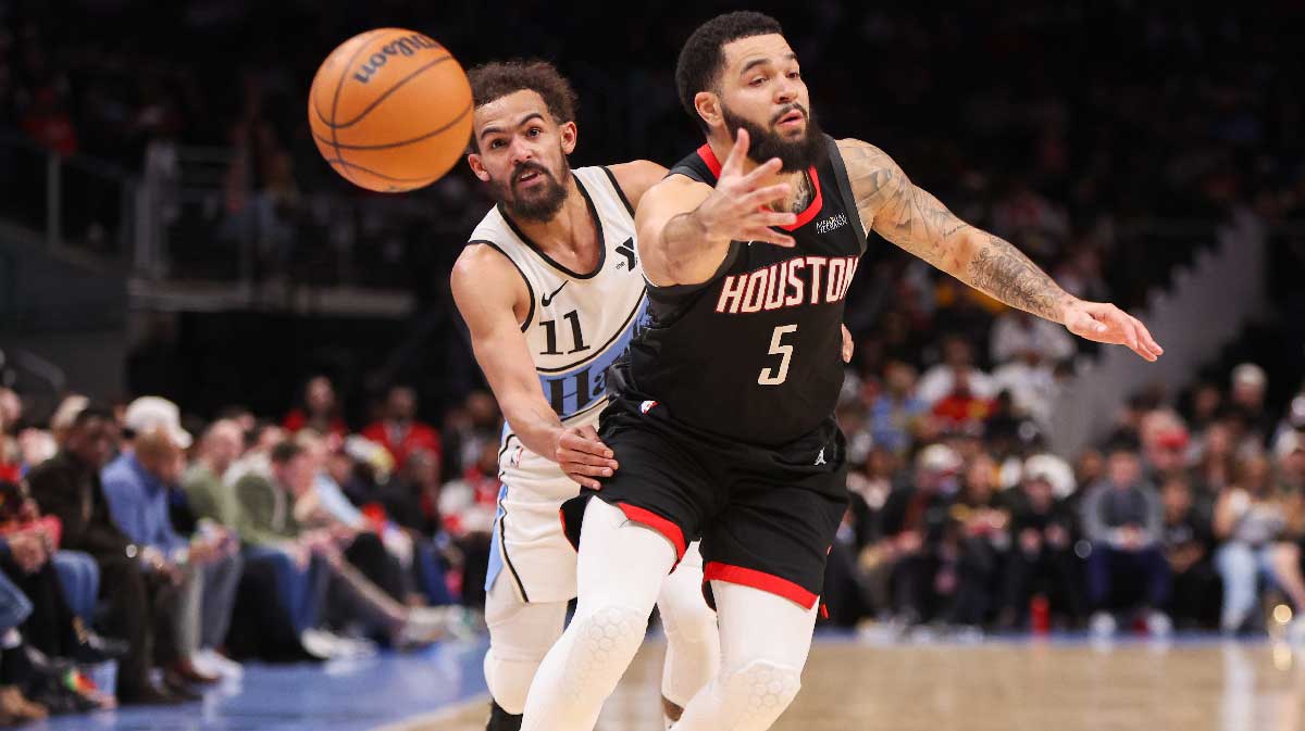 Atlanta Hawks Guard Trae Young (11) Traci Ball from Houston Rocket Keeps Fred Vanvleet (5) in the third quarter at the State Farm Arena.