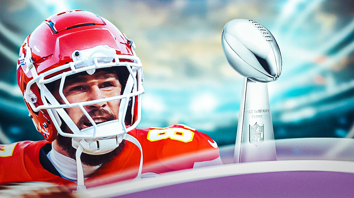 Kansas City Chiefs tight end Travis Kelce stares down the Lombardi Trophy