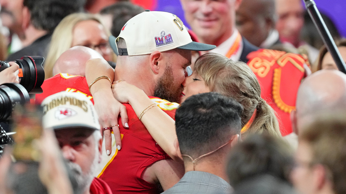 Kansas City Chiefs tight end Travis Kelce (87) kisses Recording artist Taylor Swift after winning Super Bowl LVIII against the San Francisco 49ers at Allegiant Stadium.