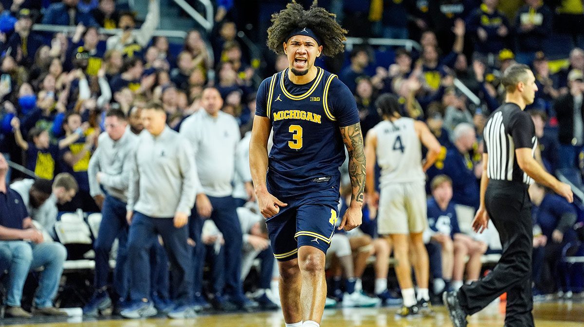 Michigan guard Tre Donaldson (3) celebrates 76-72 win over Penn State at Crisler Cente