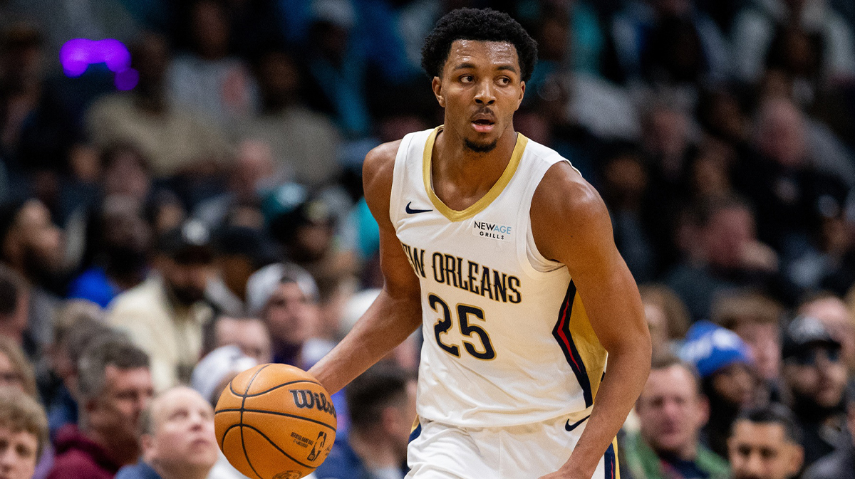 New Orleans Pelicans guard Trey Murphy III (25) brings the ball up court against the Charlotte Hornets during the third quarter at Spectrum Center.