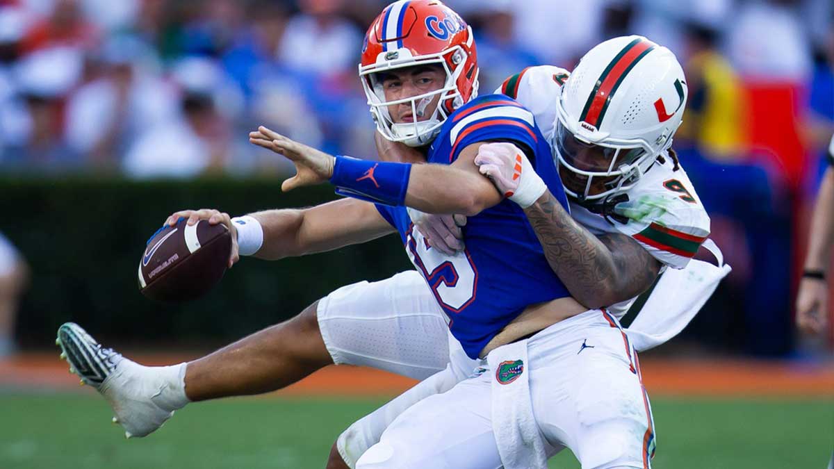 Miami Hurricanes defensive lineman Tyler Baron (9) sacks Florida Gators quarterback Graham Mertz (15) during the season opener at Ben Hill Griffin Stadium in Gainesville, FL on Saturday, August 31, 2024 against the University of Miami Hurricanes in the second half. Miami defeated the Gators 41-17.