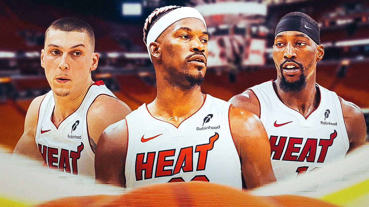 Miami Heat star Jimmy Butler in the middle with Tyler Herro and Bam Adebayo on either side in front of Kaseya Center.