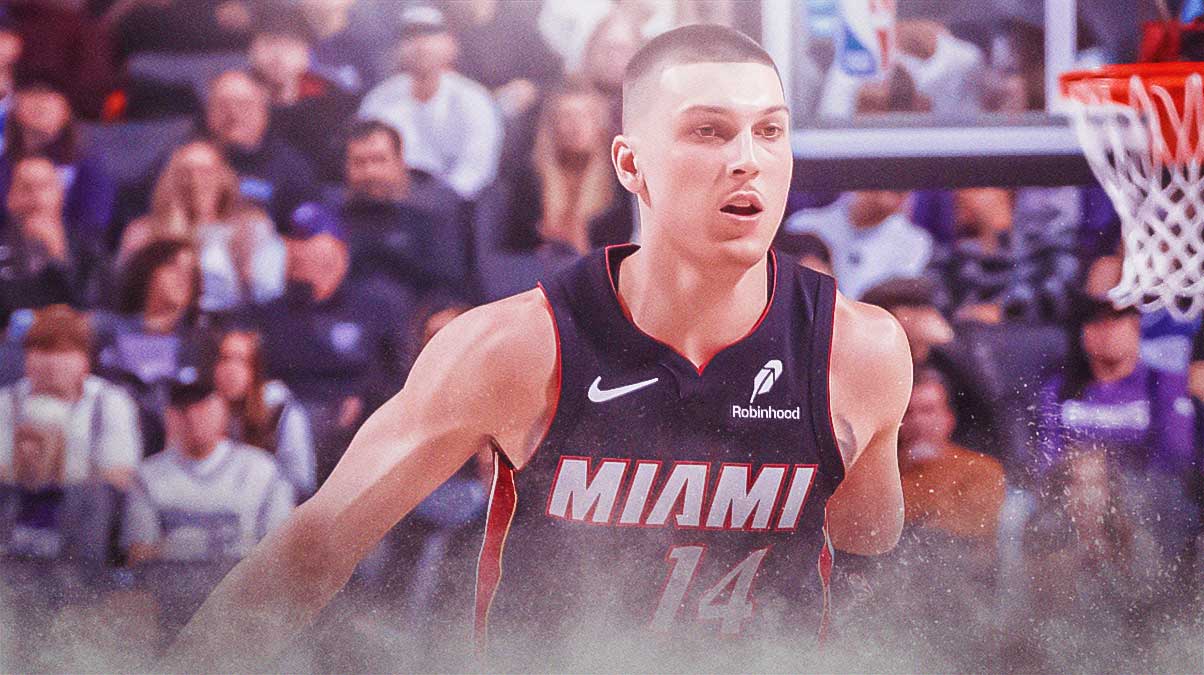 Miami Heat star Tyler Herro in front of Kaseya Center.