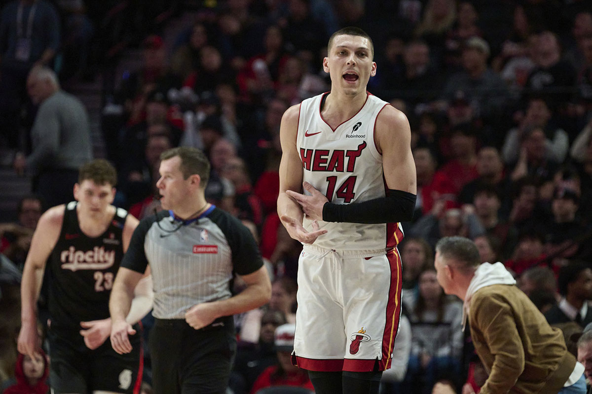 Miami Heat guard Tyler Hero (14) reacts after making a three-point field goal during the first half against the Portland Trail Blazers at the Moda Center.