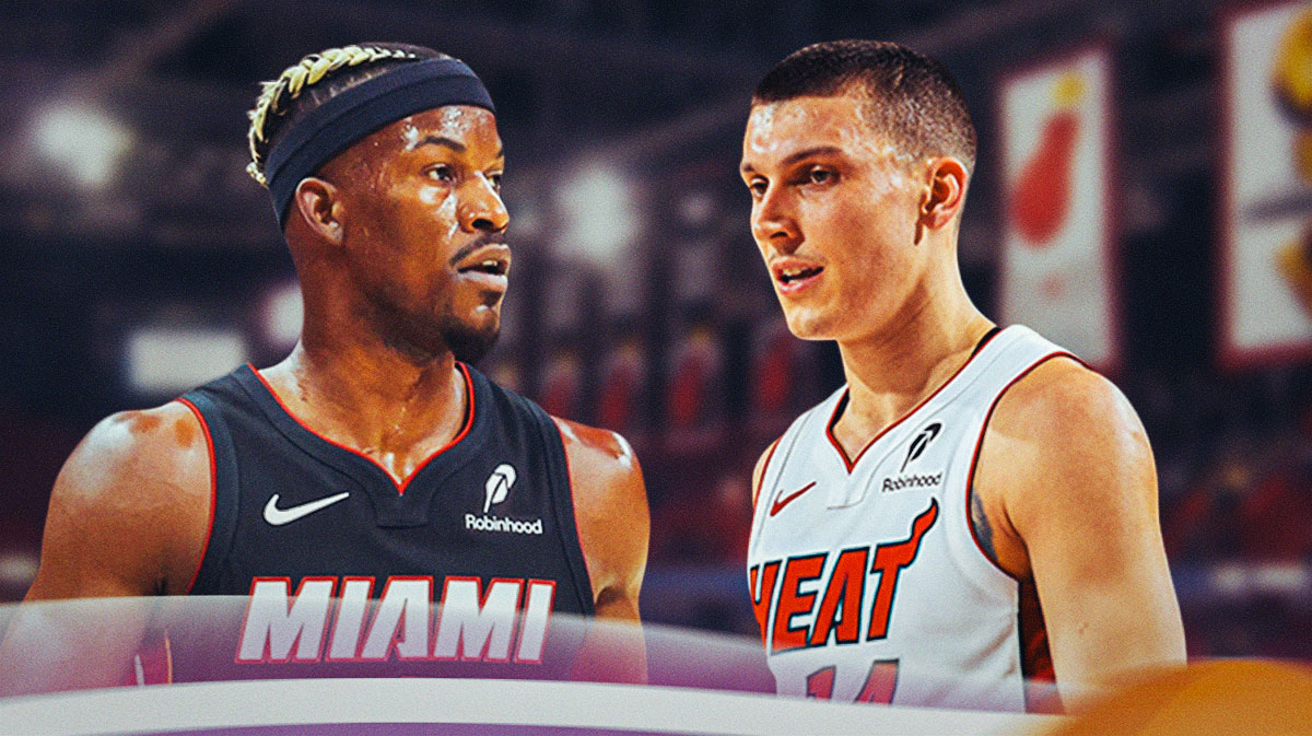 Miami Heat stars Tyler Herro with Jimmy Butler in front of Kaseya Center.