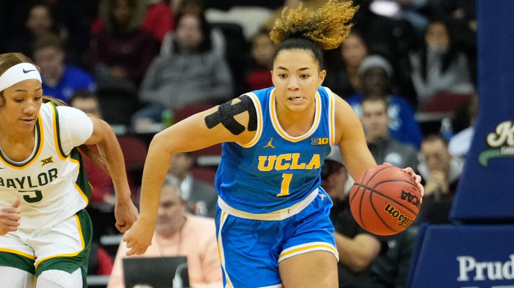UCLA Bruins guard Kiki Rice (1) dribbles the ball upcour ahead of Baylor Lady Bears guard Darianna Littlepage-Buggs (5) during the second half.