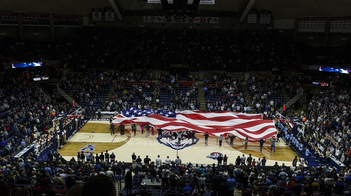 The American flag is displayed before the start of the game against the Connecticut Huskies and Tulane Green Wave at Harry A. Gampel Pavilion. UConn defeated Tulane 78-68.