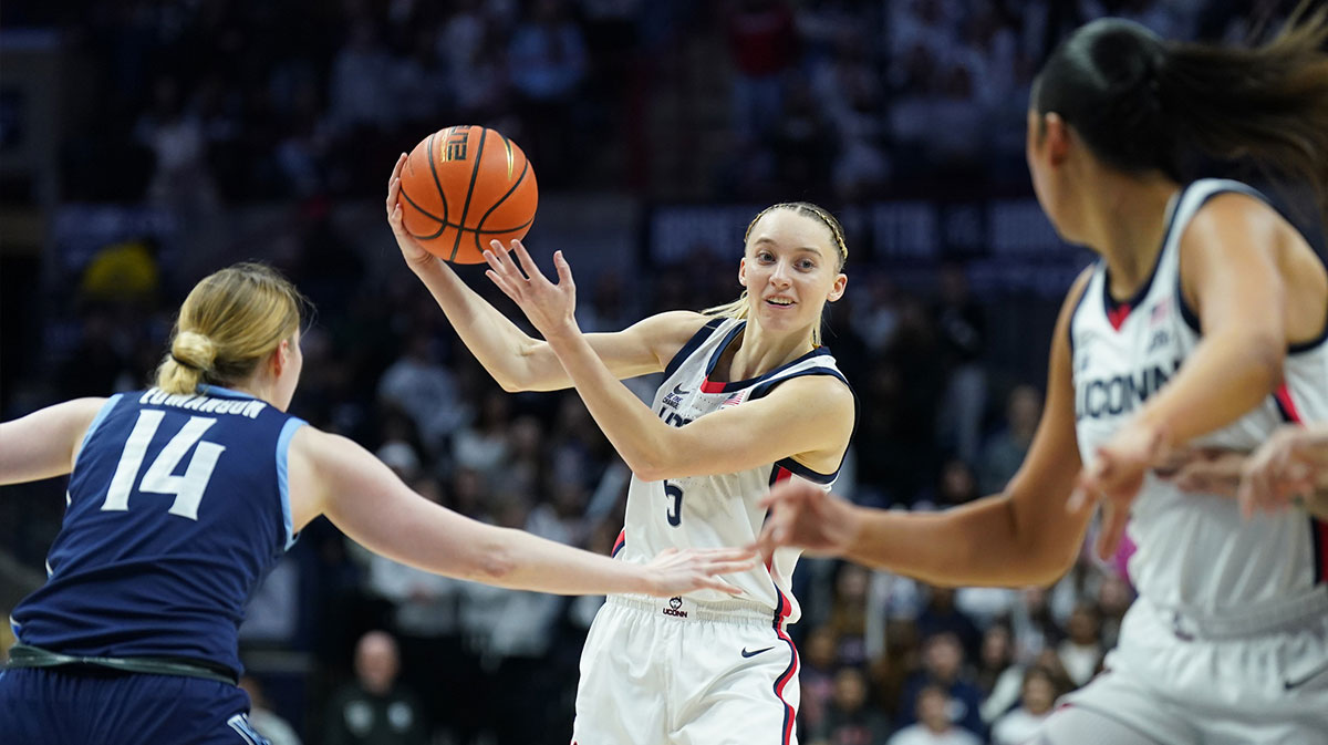 Jan 22, 2025; Storrs, Connecticut, USA; UConn Huskies guard Paige Bueckers (5) passes the ball against the Villanova Wildcats in the second half.